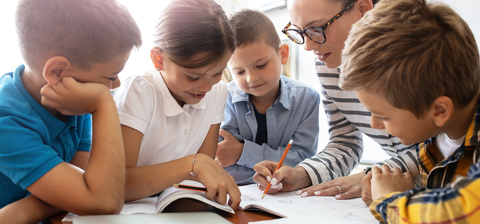 Teacher Helping Students
