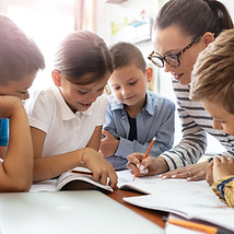Teacher Helping Students