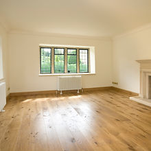 empty room with radiator and window