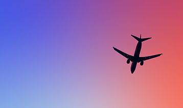 Airplane In Sunset