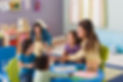 Teachers and toddlers in a daycare setting