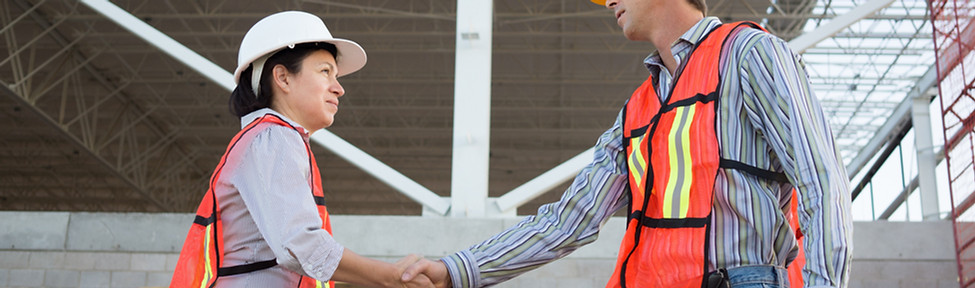 Construction Workers Shaking Hands