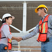 Construction Workers Shaking Hands