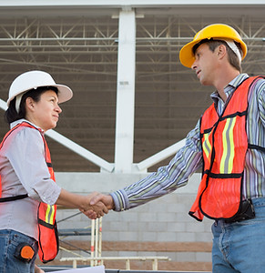 Construction Workers Shaking Hands