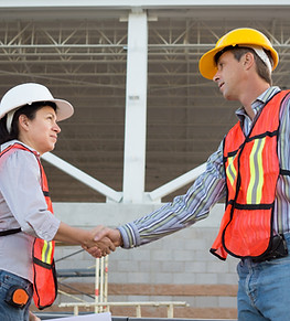 Construction Workers Shaking Hands