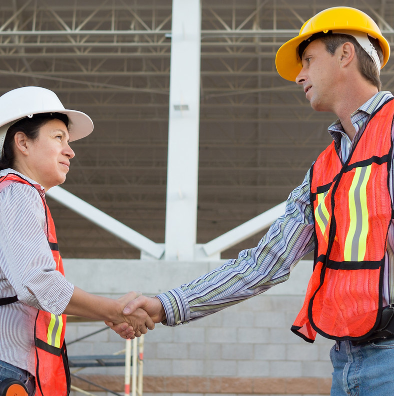 Construction Workers Shaking Hands