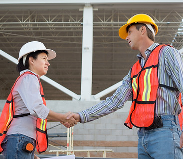 Construction Workers Shaking Hands