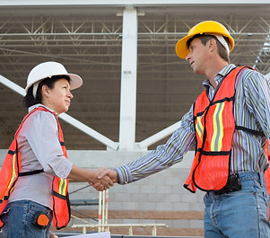 Construction Workers Shaking Hands