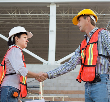 Construction Workers Shaking Hands