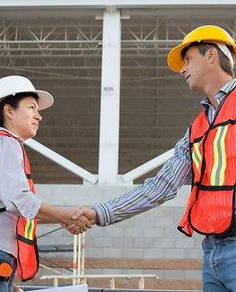 Construction Workers Shaking Hands