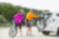 Senior couple getting ready to go mountain biking