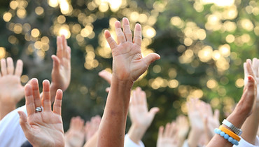Raised Hands Outdoors