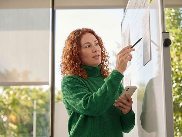 Woman at Whiteboard