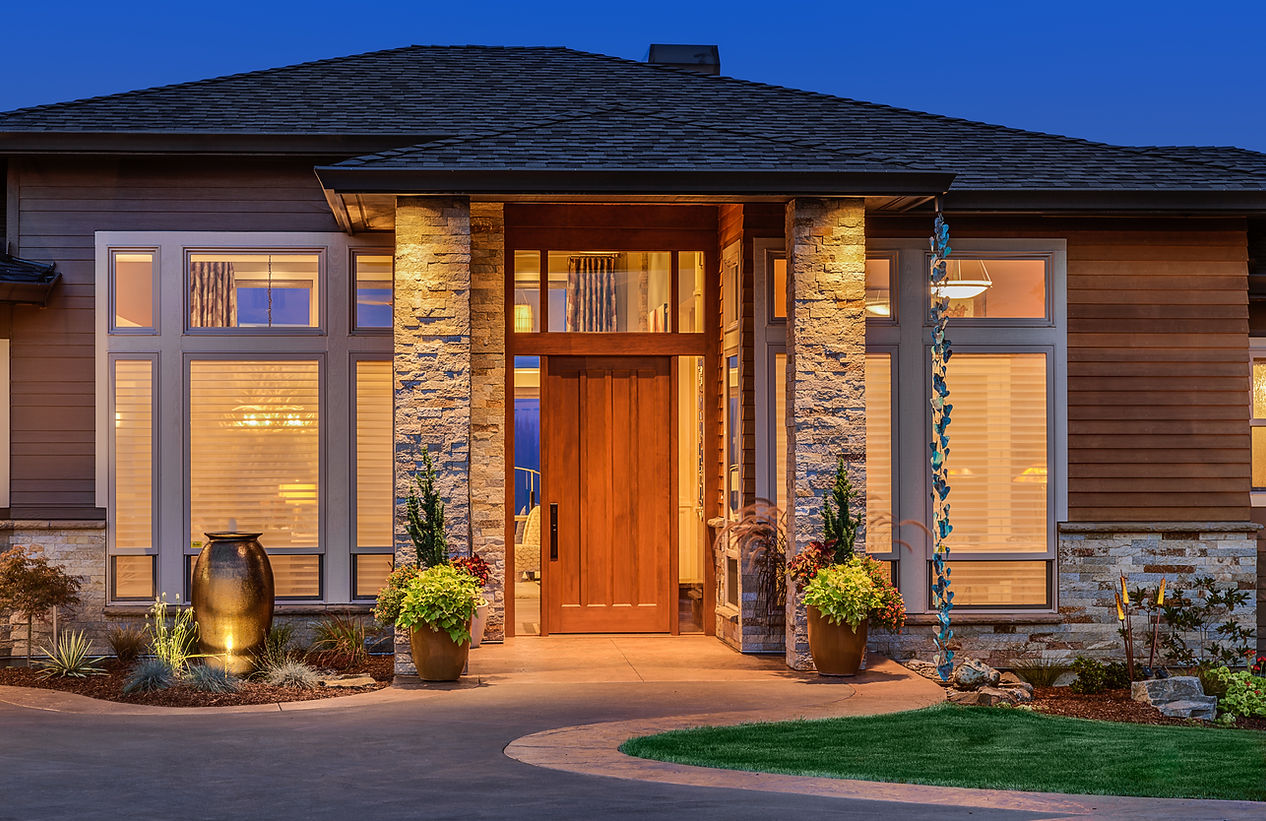 Exterior of luxury home in evening