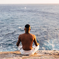 Man Meditating Ocean