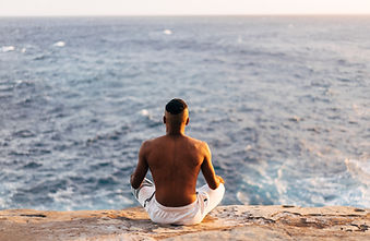 Man Meditating Ocean