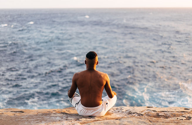 Man Meditating Ocean