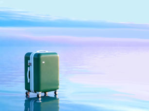 Calm ocean waves on a peaceful beach representing wellness travel and ocean therapy experiences