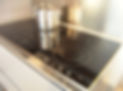 halogen electric cooktop with saucepan