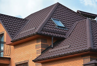 New roofing construction with attic skylights, rain gutter system, and roof windows