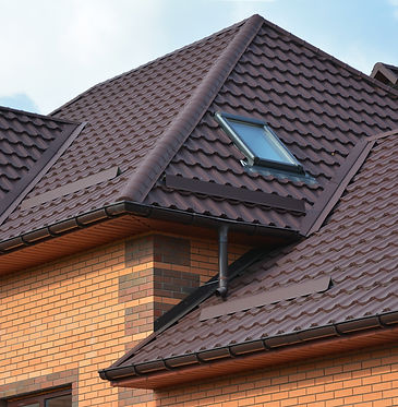 New roofing construction with attic skylights, rain gutter system, roof windows and roof p