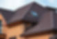 New roofing construction with attic skylights, rain gutter system and roof windows