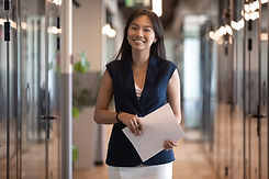 Smiling successful Asian businesswoman