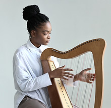 Woman Playing Harp