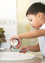 Child Brushing Teeth