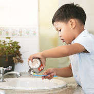 Child Brushing Teeth