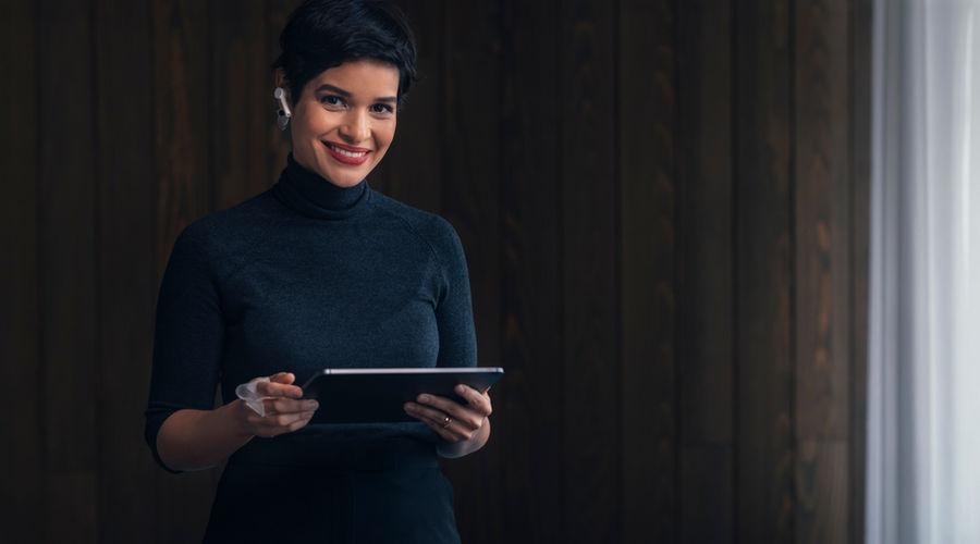 Woman using tablet for screening
