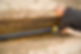 A professional installing drain pipes in a drainage ditch