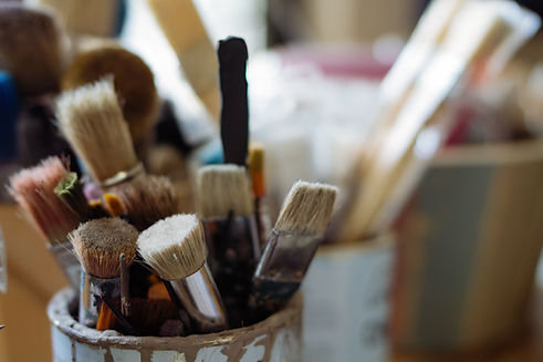 Paintbrushes in Jar