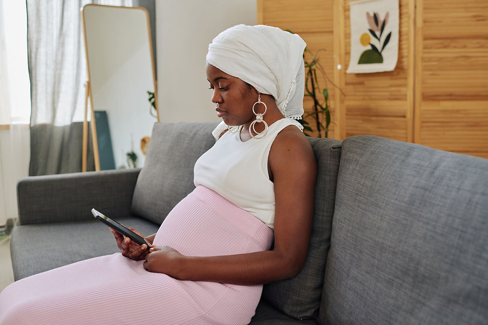 Pregnant woman resting, representing blood clot and bleeding disorder risk management during pregnancy