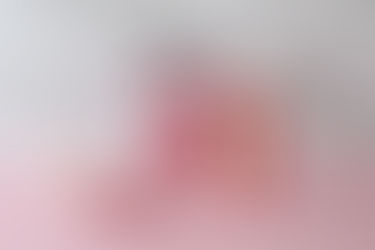 A playful Valentine's breakfast setup featuring a box of “Cereal-sly in Love” cereal and a carton of “100% Romance” milk, adding a touch of humor and sweetness to the occasion.