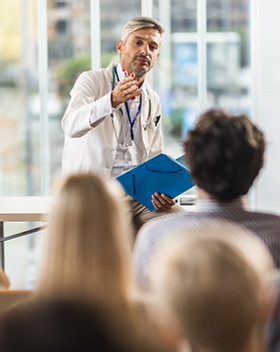 Doctor Teaching on Seminar