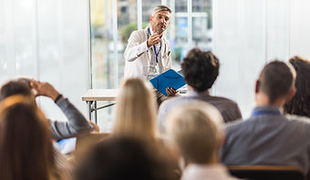 Dr. Maurizio Albala presenting an educational lecture on pain management and diabetic neuropathy.