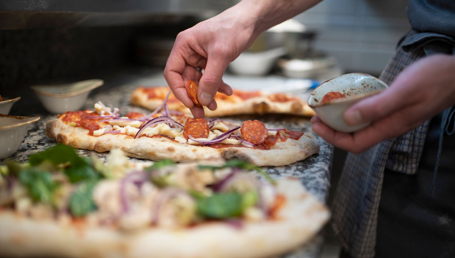 Chef Preparing Pizza