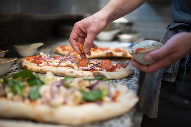 Chef Preparing Pizza