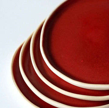 Stacked Red Plates
