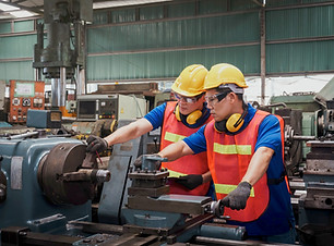 Two Technicians Working On Machine