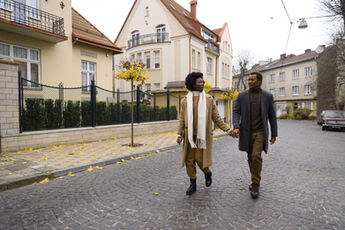 Couple walking down the street