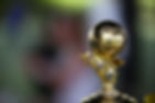 Close-Up Of Golden Football Shaped Trophy 
