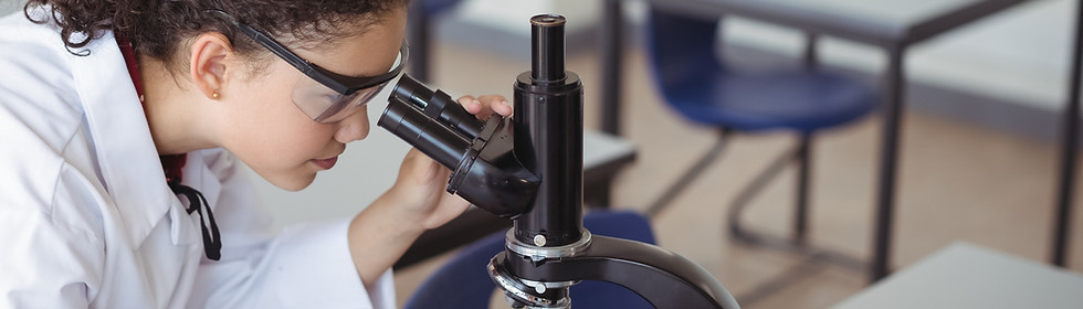 Student Using Microscope