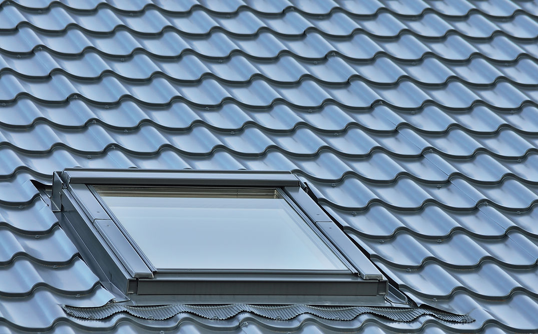 Roof window on a grey tiled rooftop, large detailed loft skylight background, diagonal roo