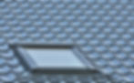 Roof window on a grey tiled rooftop, large detailed loft skylight background, diagonal roo