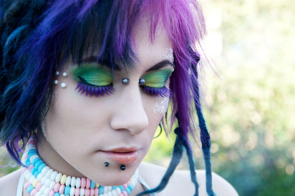 Horizontal outdoor shot of candy faery looking down