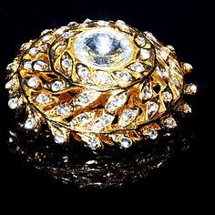 Close-Up Of Antique jewellery against black background