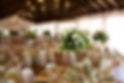 A wedding reception venue with flower decor