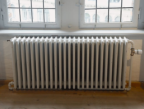 A white radiator in a room